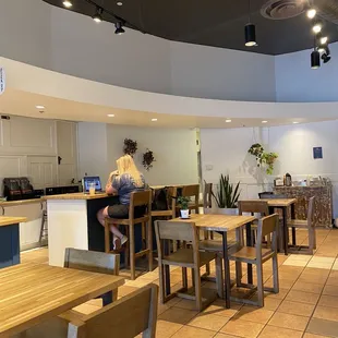 a woman sitting at a table