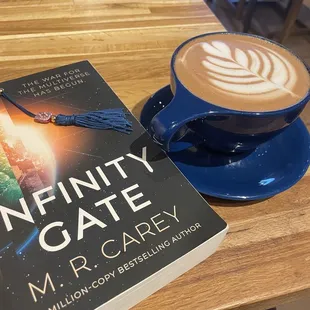 Enjoying my new book with a latte