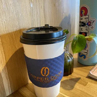 a cup of coffee on a table