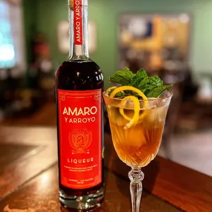 Amaro Spritz. Similar to an Aperol Spritz, made with our double gold award winning Amaro y Arroyo liqueur.