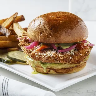 Crispy Chicken Sandwich - Jalapeno Vinaigrette, Roasted Tomatoes, Pickled Onion, Cotija Cheese, Avocado Mash