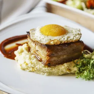 Bacon &amp; Egg - house cured pork belly, charred corn grits, house made barbecue sauce, fried egg