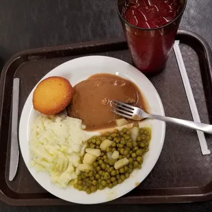 My meal is Salisbury Steak, sweet peas and mashed potatoes.