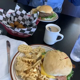 Club sandwich, fried mushrooms, and stuffed burger