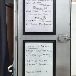 menus on the side of a refrigerator