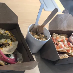 Steak taco with chimichuri, Mexican street corn &amp; the nachos with queso and pico