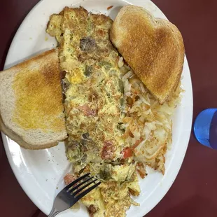 an omelet and toast on a plate