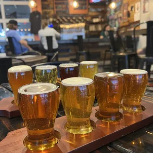 a flight of beer glasses