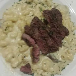 Steak cavitappi minus tomatoes. Good flavor to the steak. I didn't ask for a specific temp. They did good, Imo.