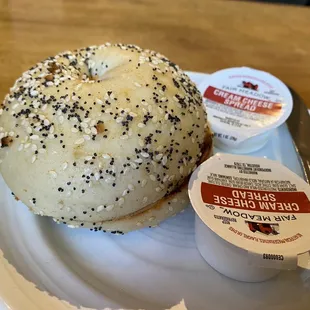 a bagel sandwich and a cup of coffee