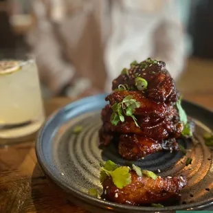 a plate of food on a wooden table