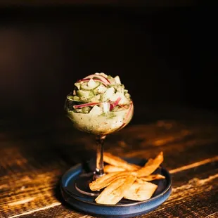 a plate of food on a wooden table