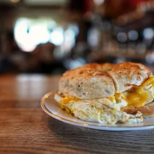 a breakfast sandwich on a plate