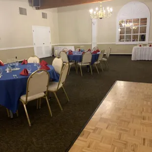 tables with blue tablecloths