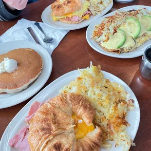 croissant sandwich with ham, garden omelette, pancakes