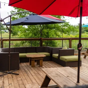 patio with tables and umbrellas
