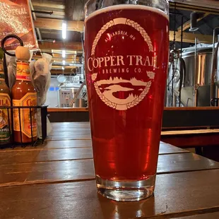a pint glass on a table