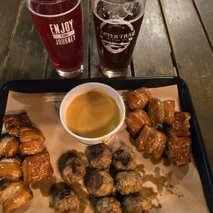 a tray of chicken wings and dipping sauce