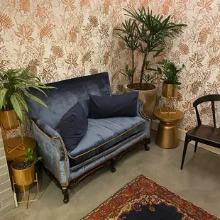 Cute little couch in the bathroom
