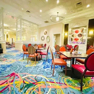 brightly colored tables and chairs