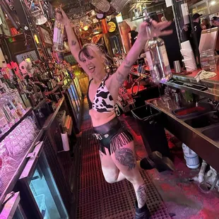 a woman in a cowgirl outfit