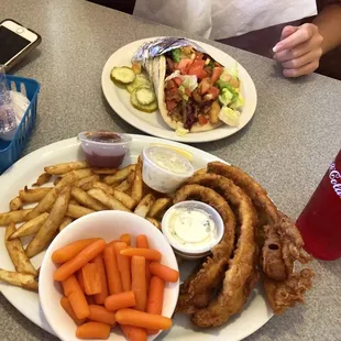 Lake perch and fries, and a chicken finger pita + bacon!