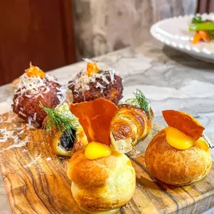 Appetizer sampler: Croissant au Escargot, Beignet de Pomme de Terre, Gougère au truffle |Instagram @restaurant_aholic