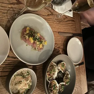 Hot oysters, yellow tail tuna, and shrimp roumalade