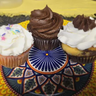 My trio of cupcakes: strawberry, chocolate, and marble.