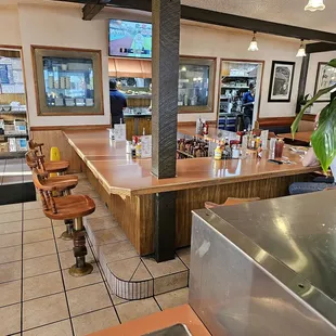 the interior of a coral cafe