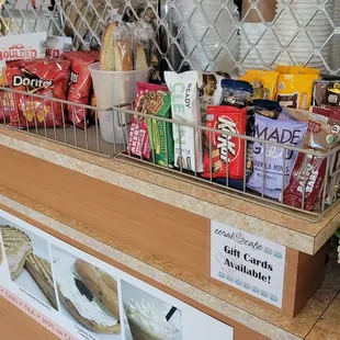 Various snacks (chips, candies, granola bars, etc) for sale