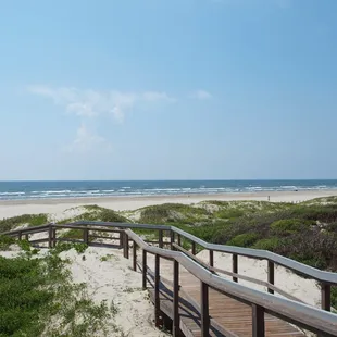 Coral Cay's boardwalk to the port a beach
