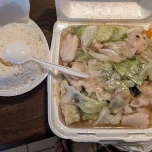 Filet of rock cod with veggies with rice..