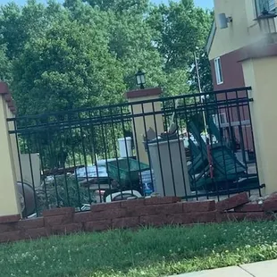 This is the outdoor patio full of random junk. The indoor pool is boarded over and looks pretty much like this.