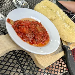 a plate of pasta and bread