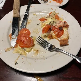 Here is the glob of cheese, tomatoes and no flavor..