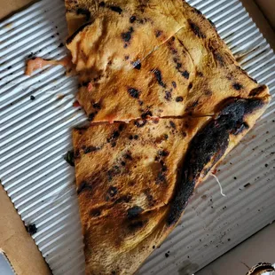 Visibly burned.  But even the parts that aren&apos;t burned taste burned.