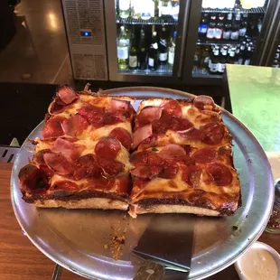 Pepperoni, Ham and Capicola Deep Dish - well done and light sauce - amazing!