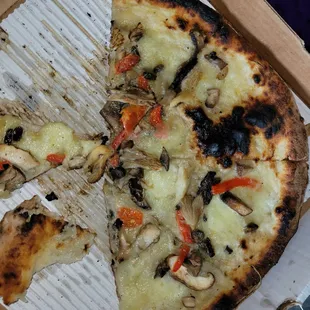 Mushroom and pepper.  Greasy and burned.