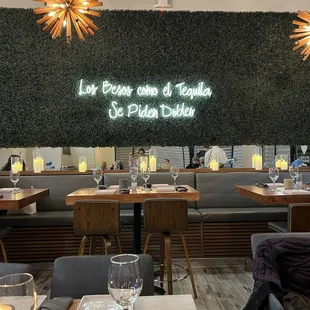 Love this sign. "Kisses are like tequila, you order in double"