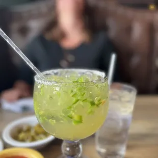 Jalapeño Margarita and a saucy little minx laughing it up in the background.