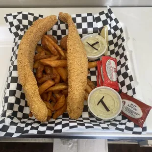 a basket of fries and a hot dog
