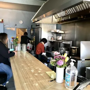 people in a restaurant kitchen