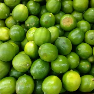 Plenty of limes to go along with a bottle of tequila!