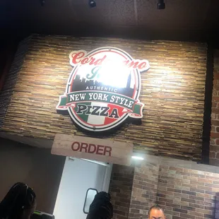 a man standing in front of the counter