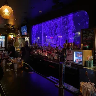people sitting at a bar