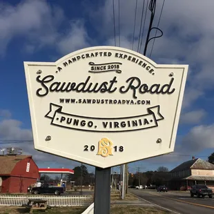 a sign for sawdust road
