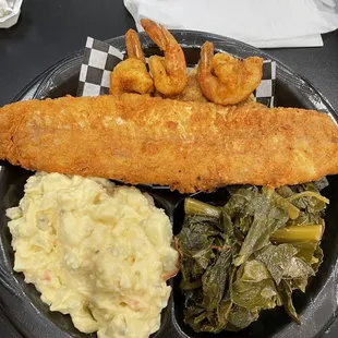 Seafood Platter with collards and potato salad