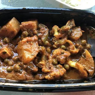 Vegetable Jalfrezi-good! Veggies vary but this time had peas, cauliflower, green peppers, potatoes, scallions, carrot, paneer