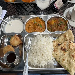 Vegetarian lunch combo: The main dish items are Shahi Paneer Korma and Kabuli Chana.